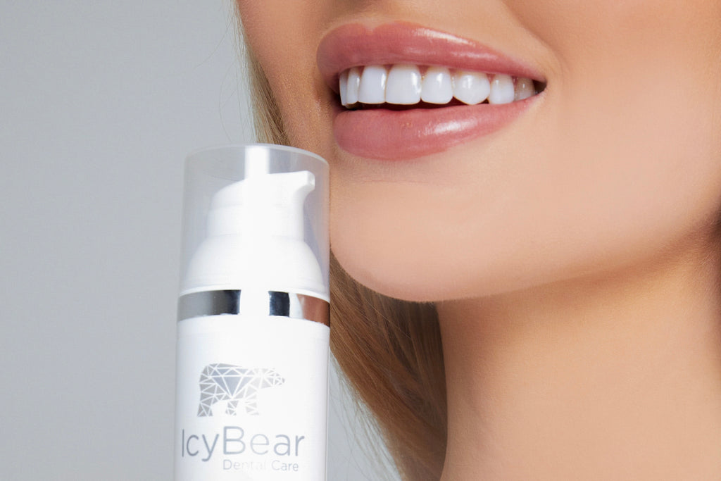 smiling with teeth whitening toothpaste
